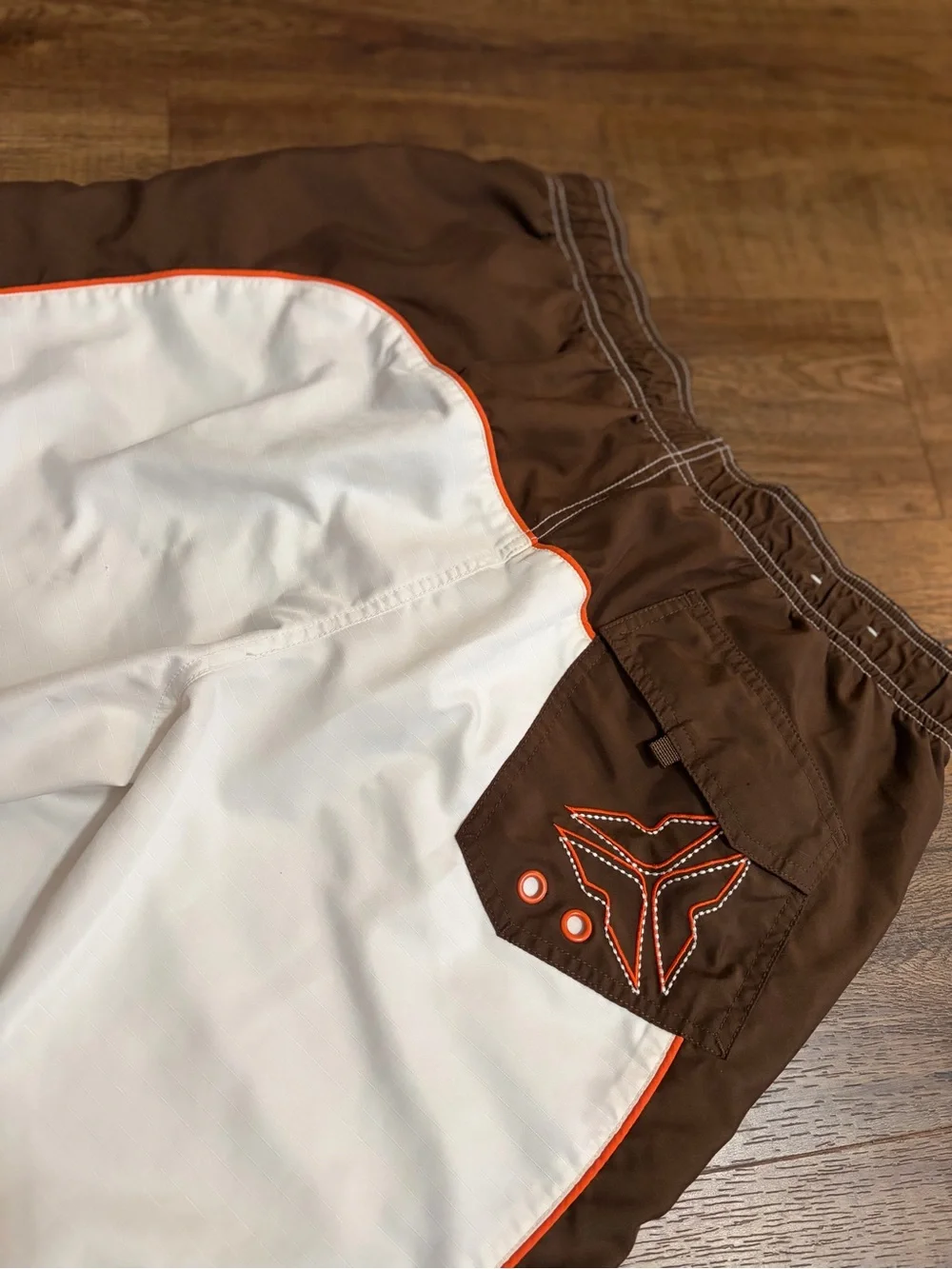 Old Navy White Swim Trunks with Brown Panels and Orange Trim